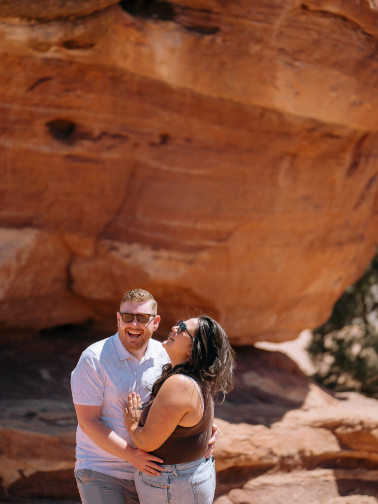 Happy couple after surprise proposal and Garden of the Gods in Colorado Springs | Engagement photography