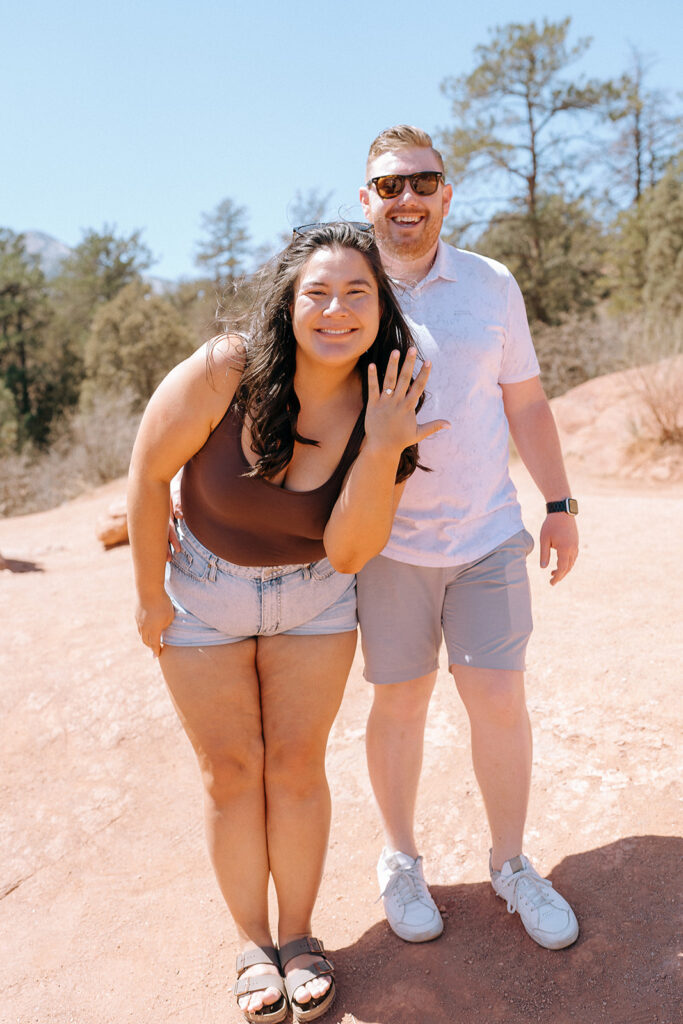 Happy couple after surprise proposal at Garden of the Gods | Engagement photography