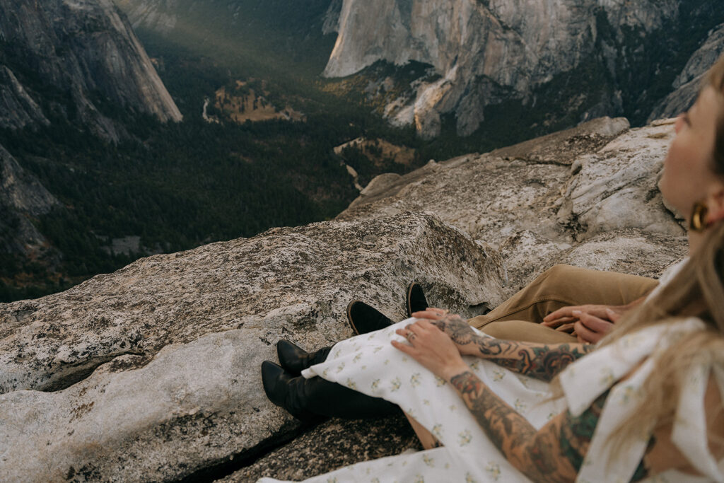 A quiet moment on the rocky overlook of Taft Point, with sweeping views of Yosemite Valley, photographed by a Yosemite photographer.